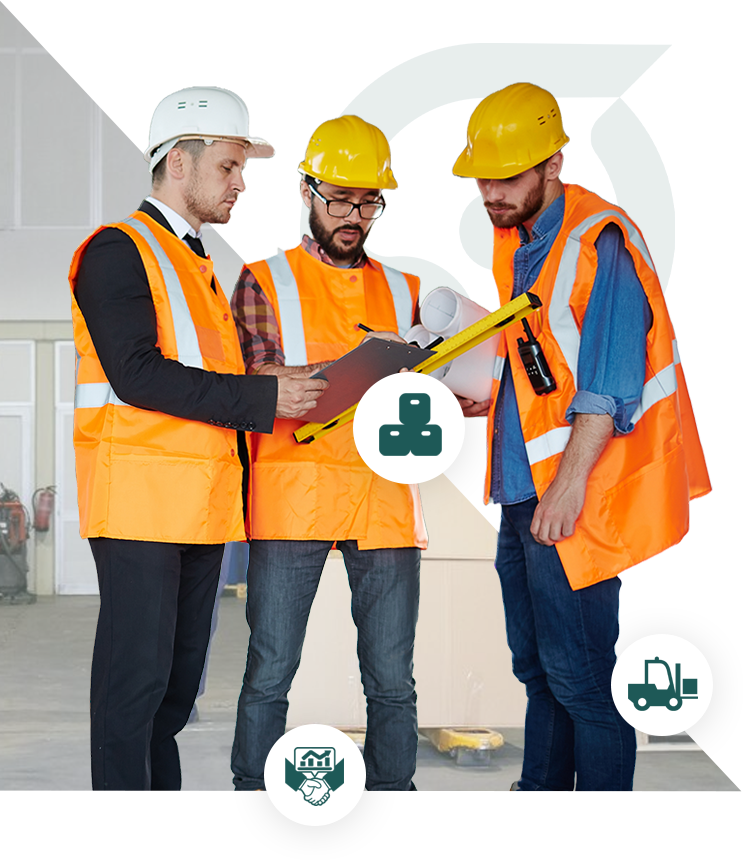 Three construction workers in hard hats and safety vests review plans on a clipboard.